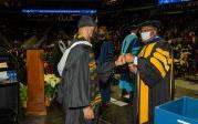 Students could not contain their excitement as they walk off the stage. Photo Chuck Thomas/ODU